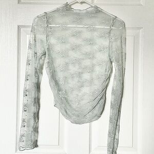 Faux turtleneck sheer top